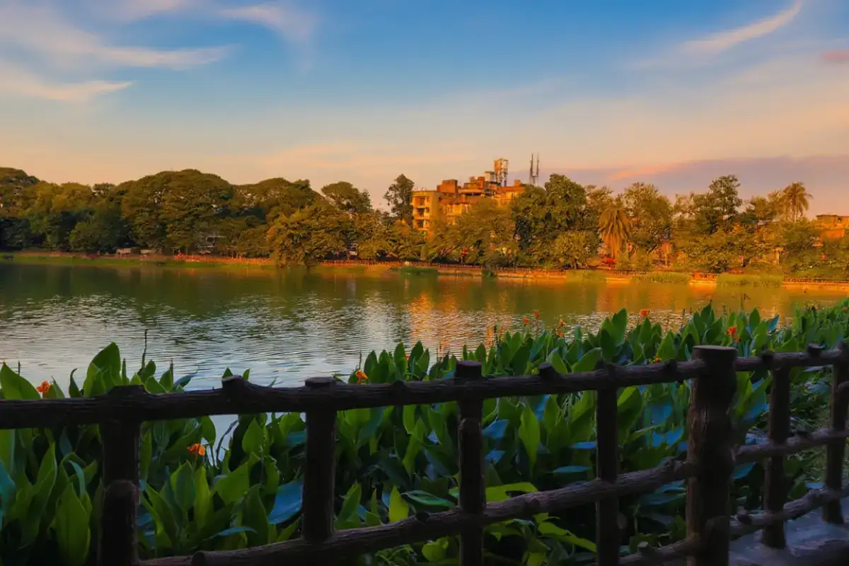 Dighali Pukhuri in Guwahati, a serene lake surrounded by lush greenery and historic monuments